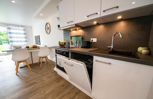 Damp House | Baltic Village