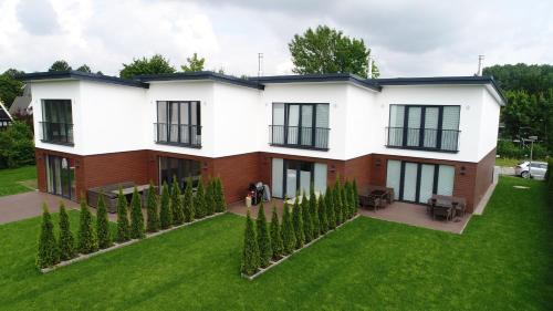 Damp House | Baltic Village
