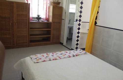 Itaparica House | Bangalô Aconchegante com Suíte, Sala de Estar, Cozinha Equipada e Varanda