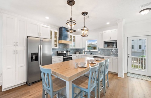 Upper Grand Lagoon Condo | Barefoot Boat Bums by Book That Condo