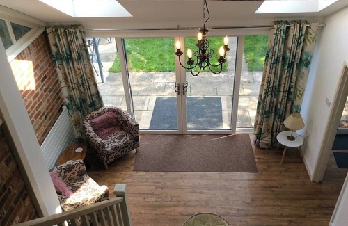 Stratton Strawless House | Barn with countryside views in private garden