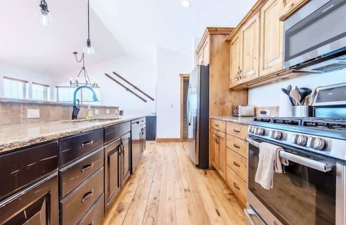 Victor House | Basecamp Stays: Family Fun, Fireplace, & Huge Deck