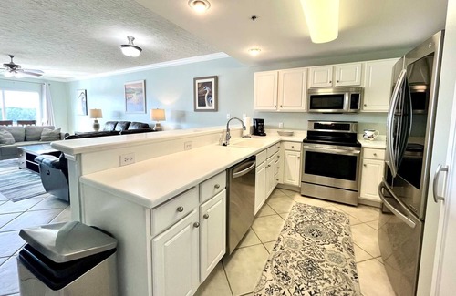 Gulf Shores Condo | Bay John 406 Water Front 3/3 near shopping, dining, & boat friendly!