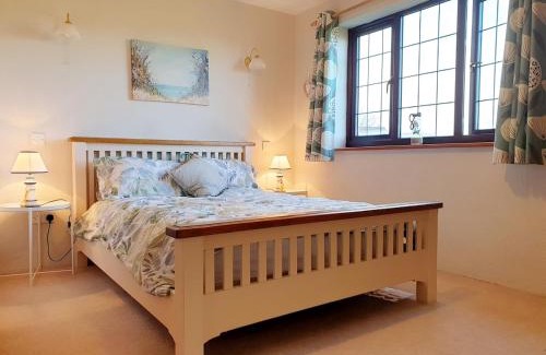 North Buckland House | Bay Tree Cottage - cosy home near beach