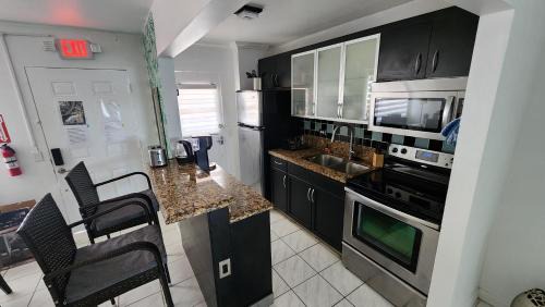 North Bay Village Apartment | Bayfront Apartment Breathtaking Views- one bedroom w balcony- living room -Free Parking