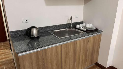 Tambo Hotel | Bayport West Naia Residences