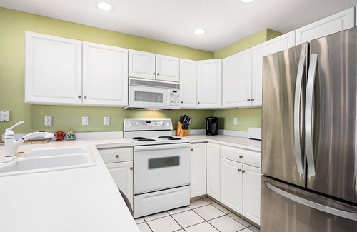 Heron Harbour Isle Condo | Baywatch III B201 - pretty 3 bedroom on canal with outdoor pool.