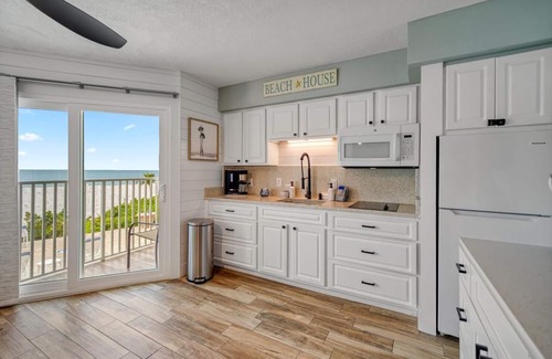 Belleair Beach Condo | BBC111 Renovated Beachfront Condo W/Pool