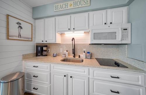 Belleair Beach Condo | BBC111 Renovated Beachfront Condo W/Pool