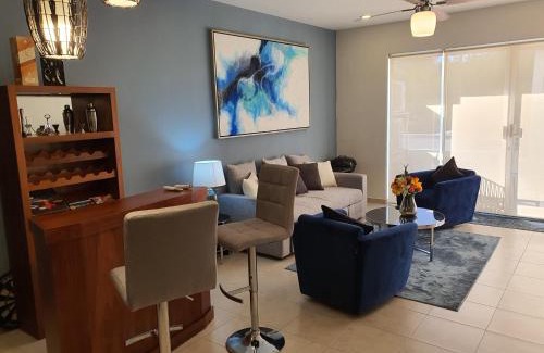 El Tezal Apartment | Beach Bliss Retreat, Renovated Condo with Rooftop Pool, Grill, and Game Night Vibes!