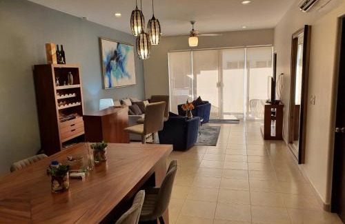 El Tezal Apartment | Beach Bliss Retreat, Renovated Condo with Rooftop Pool, Grill, and Game Night Vibes!
