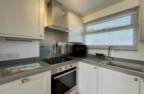 Westleigh Ski Chalet | Beach Cottage 43, A stone's throw from the sea