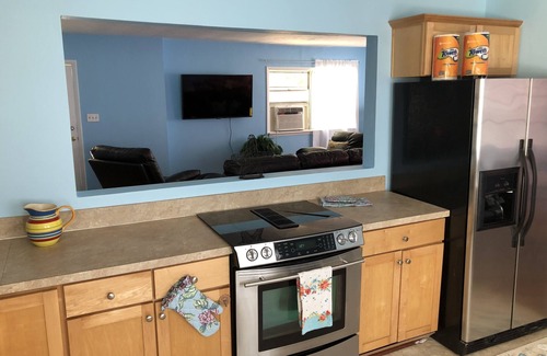 Cottage Line House | Beach Front on the Bay in our Rustic, Pet Friendly Cottage by RedAwning