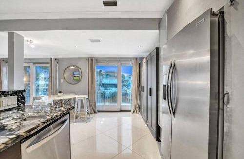 Hendricks and Venice Isles Apartment | Beach Isles Modern 1BR Waterfront Apartment with Patio