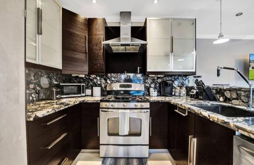 Hendricks and Venice Isles Apartment | Beach Isles Modern 1BR Waterfront Apartment with Patio