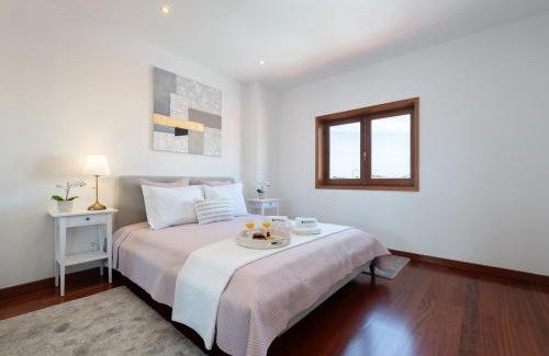 Vila Cha House | Beach Villa with Jacuzzi & Garage by HostWise