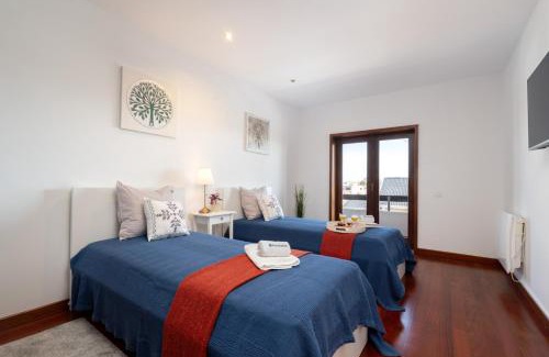 Vila Cha House | Beach Villa with Jacuzzi & Garage by HostWise