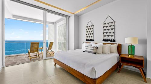 Las Glorias Apartment | Beachfront 2BR Condo - Resort Pools & Scenic Balcony Views