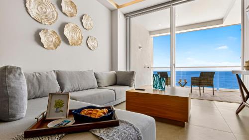 Las Glorias Apartment | Beachfront 2BR Condo - Resort Pools & Scenic Balcony Views
