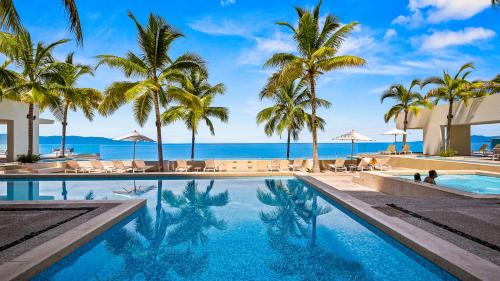Las Glorias Apartment | Beachfront 2BR Condo - Resort Pools & Scenic Balcony Views