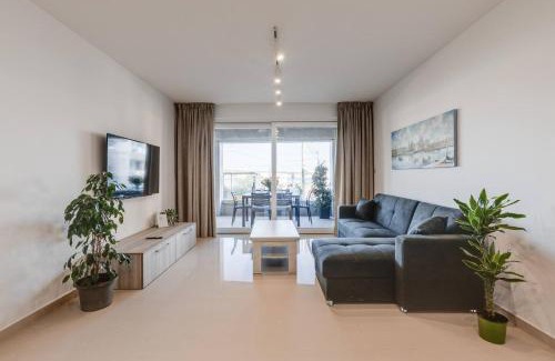 Għadira Apartment | Beachfront 9ten11 Maisonette W Terrace By Homely