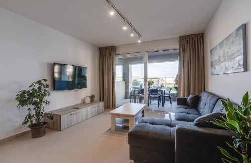 Għadira Apartment | Beachfront 9ten11 Maisonette W Terrace By Homely