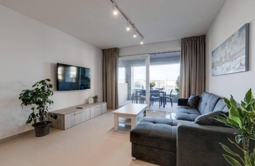 Għadira Apartment | Beachfront 9ten11 Maisonette W Terrace By Homely