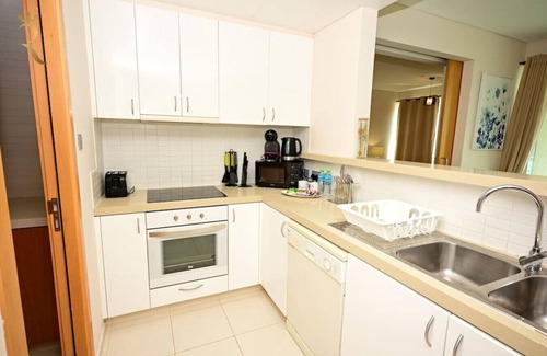 Al Raha Beach Apartment | Beachfront Beauty: 1BR Retreat for Your Getaway