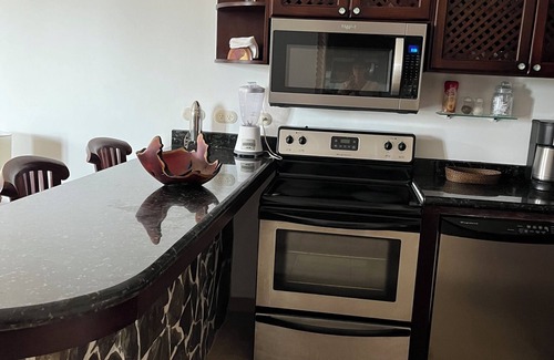 Barrio Los Villalobos Condo | Beachfront condo with rooftop patio and amazing views in the heart of Jaco .
