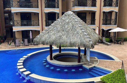 Barrio Los Villalobos Condo | Beachfront condo with rooftop patio and amazing views in the heart of Jaco .