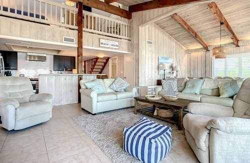 Sea Dunes House | Beachfront Deck with steps down to the white sandy beach! Sea Dunes Sandcastle 1A