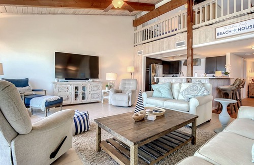 Sea Dunes House | Beachfront Deck with steps down to the white sandy beach! Sea Dunes Sandcastle 1A