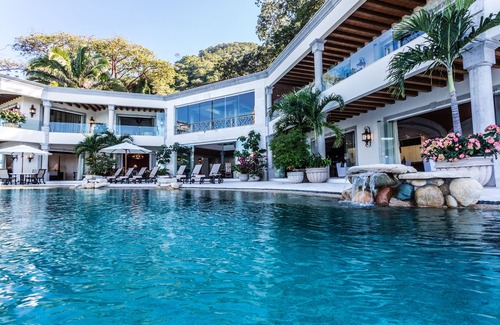 South Shore Hotel Area Villa | Beachfront Estate with sunset views over the famous Los Arcos of Puerto Vallarta