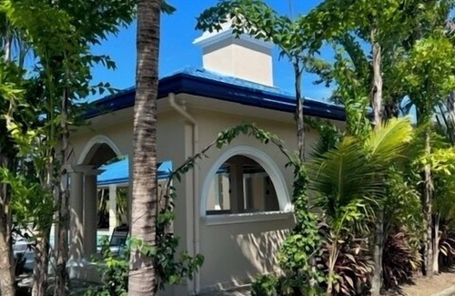 Tela House | Beachfront getaway,5 minutes from shore! Featuring a pool & recreational spaces.
