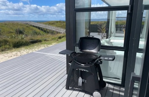 Ruakaka House | BEACHFRONT holiday home with stunning views& modern comforts -1h35 from Auckland