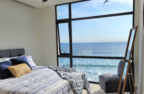 Primo Tapia Condo | Beachfront Luxury Condo Pool Jacuzzi