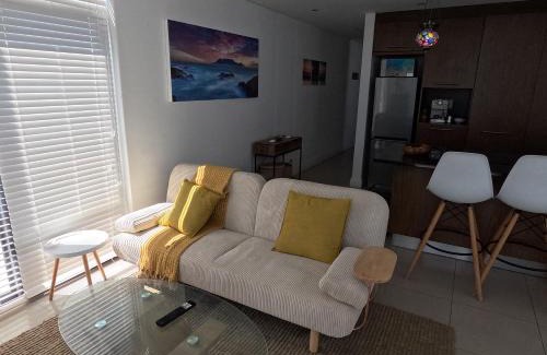 Big Bay Apartment | Beachfront Penthouse with patio and free parking