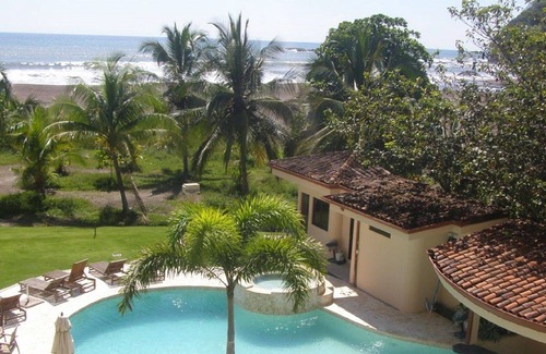 Barrio Los Faroles Condo | Beachfront Perfection, Mountain and Rainforest View - Jaco Beach at Tres Regalos