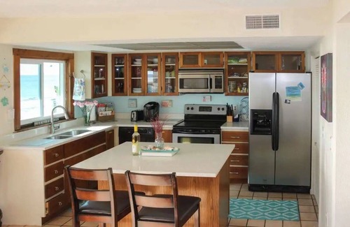 Belleair Beach Condo | BEACHFRONT! Quiet Belleair Beach condo with amazing Gulf of Mexico sunset views!