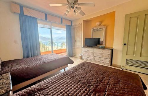Marina Vallarta Apartment | Beachfront Stay with 3 Pools Spa Gym Kids Club and Tennis