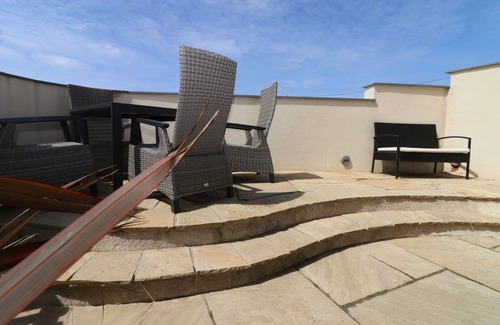 Constantine Bay Apartment | Beachside apartment with a private patio garden and beautiful sea views