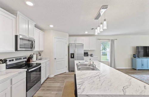 Indian Trails House | Beachy Keen Retreat | Palm Coast | Close To Golf & Beach | Dog Friendly Fenced Yard | Garage Access