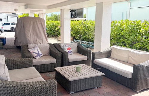Key Largo Village House | Beautiful 3 bd 2 bth on Canal - Private Beach - Convenient Ocean Access