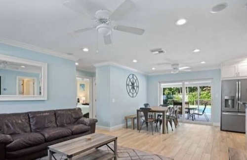 Jupiter House | Beautiful 4 bd-2 bath getaway with grill & crib and just minutes from the beach.
