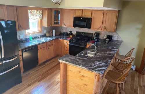 Lake Luzerne House | Beautiful 5 bedroom Waterfront House w/skiing/snowboarding/snow mobile path near