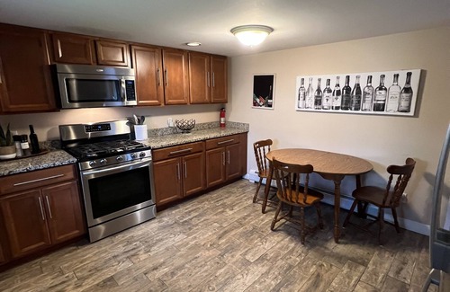 Pittsfield House | Beautiful 8 Bedroom, Walk to Lake, Jetted Hot Tub, Fireplace, & Pool Table