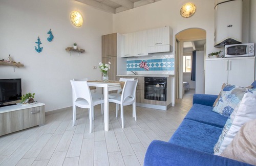 Paduledda Apartment | Beautiful apartment for 4 guests with pool, A/C, TV, terrace and pets allowed