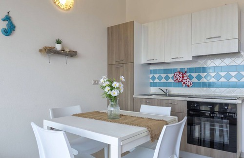 Paduledda Apartment | Beautiful apartment for 4 guests with pool, A/C, TV, terrace and pets allowed