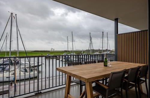 Kamperland Apartment | Beautiful apartment with beautiful views of the lively marina