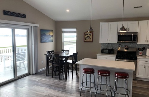 Green Creek Condo | Beautiful Bayfront Duplex with Boat Slip